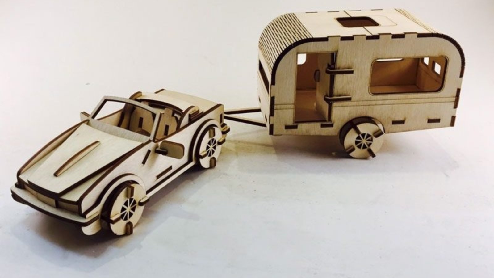 Wooden-model-of-caravan-3d-free-laser-cutring-file.webp